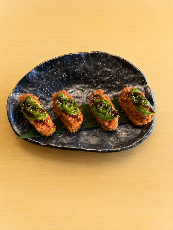 Suki crispy rice topped with spicy tuna